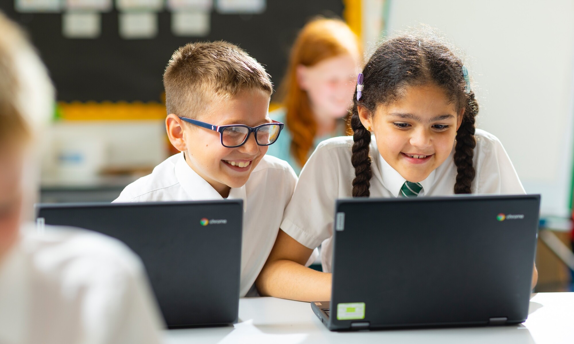 Hawkes Farm Academy - Two Pupils using Laptops