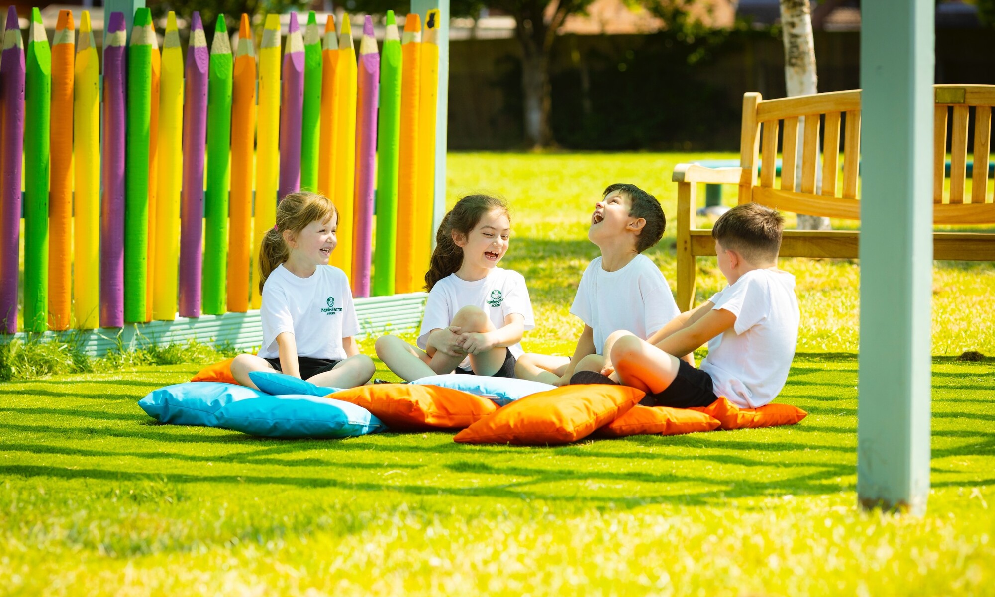 Hawkes Farm Academy - Four Students sitting and laughing